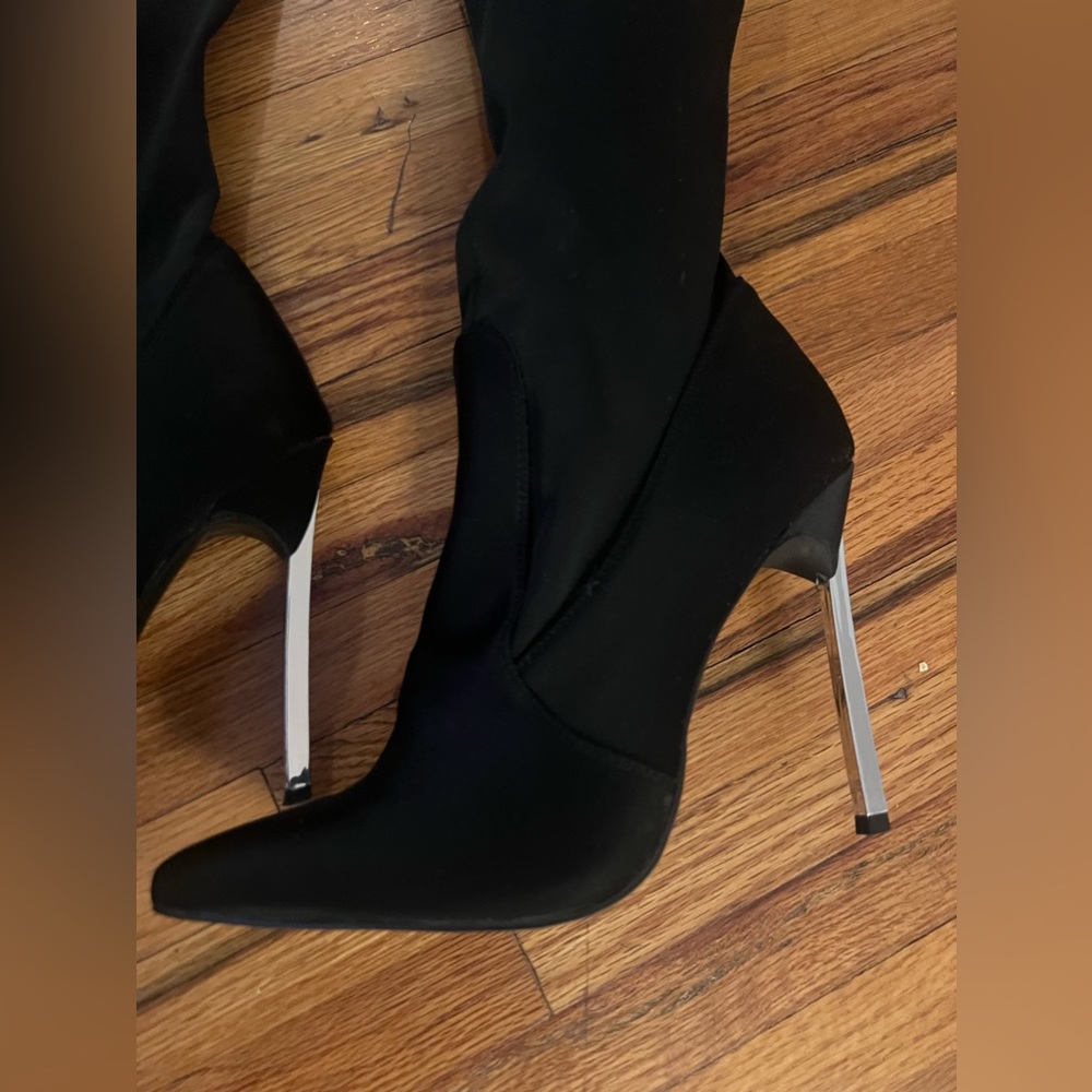 Ego Official black, thigh, high boot with chrome heel
